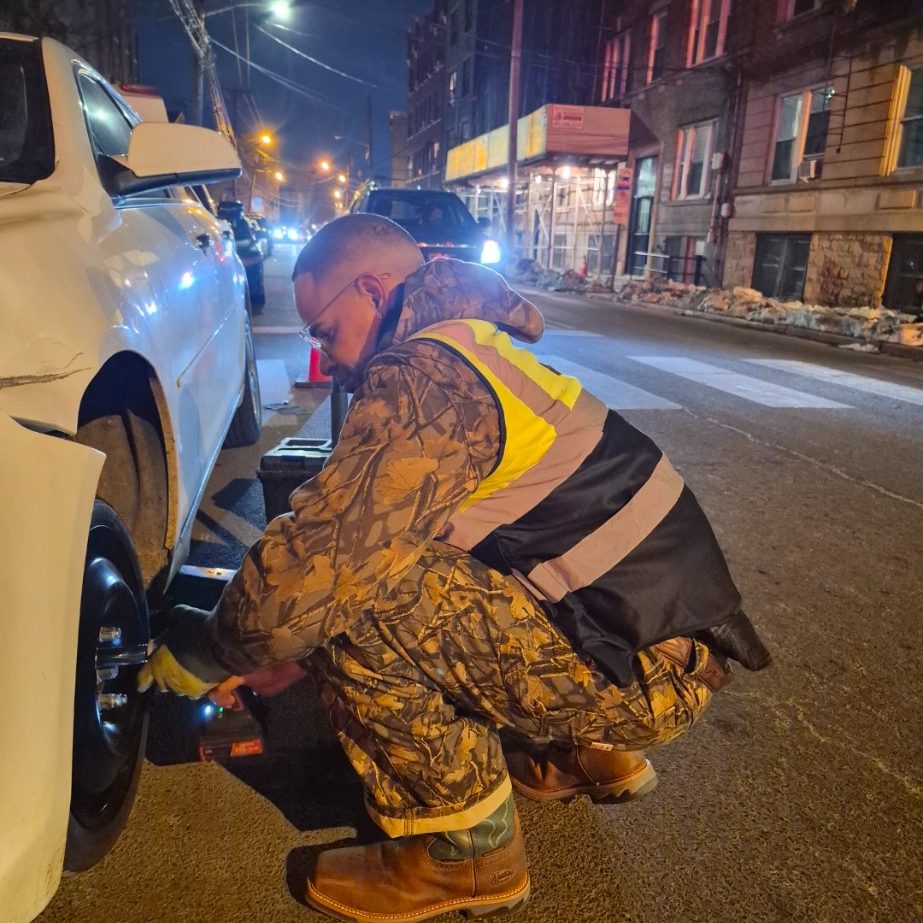 HAppy road services tire change tire change in Jersey city NJ late at night by happy road services