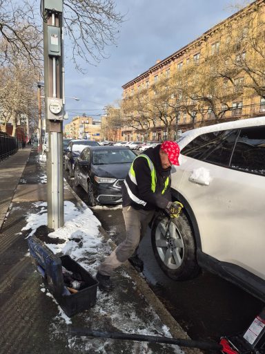 24/7 Roadside Assistance in Hoboken NJ | Happy Road Services Roadside Assistance Helping with a Flat tire repair |tire change in HOBOKEN NJ