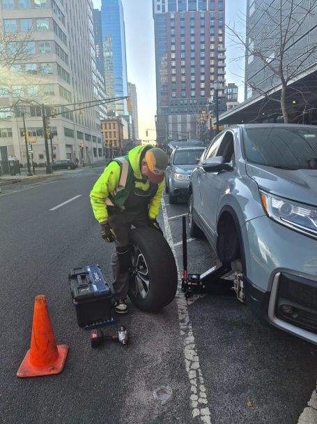 Happy road services Doing a tire change in jersey city Roadside Assistance Performing a Tire repair / Tire change in jersey city NJ , Hudson County
